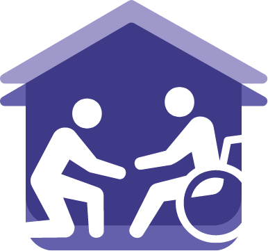 person on wheel chair in front of house